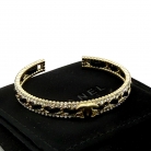 Pulsera Chanel en metal color champán
