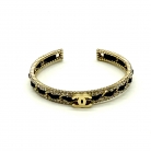 Pulsera Chanel en metal color champán