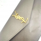 Saint Laurent Pochette Uptown cuero