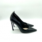 Tacones Dior con adorno estrella en plateado