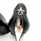 Tacones Dior con adorno estrella en plateado