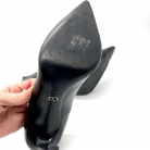 Tacones Dior con adorno estrella en plateado