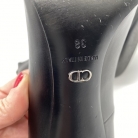 Tacones Dior con adorno estrella en plateado