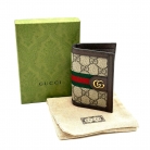 Tarjetero Gucci de lona beige guccisima and marron skin