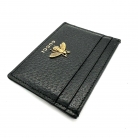 Portacarte Gucci in pelle nera con dettagli oro