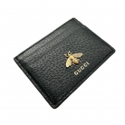 Portacarte Gucci in pelle nera con dettagli oro
