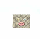 Tarjetero Gucci GG Supreme