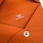 Hermès Calvi card holder in Orange H leather