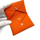 Hermès Calvi card holder in Orange H leather