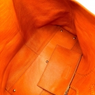 Tote Yves Saint Laurent de piel reversible, marrón y naranja