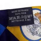 Hermès Twilly silk scarf in blue and yellow tones with a dog motif